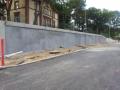Finishing of a pile retaining wall